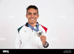 Mexico's diver and silver medalist Juan Manuel Celaya Hernandez poses for a  portrait, during a photo session at the Champions Park, at the Trocadero,  Tuesday, Aug. 6, 2024, in Paris, France, during