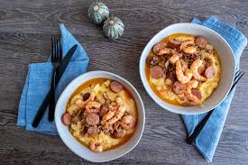 Shrimp and grits is a southern dish everyone—regardless of where you're from—should know how to make. Shrimp And Grits With Andouille Sausage Recette Magazine
