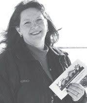 Debbie Neitzke “paddles away”