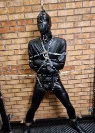 Rubber gimp in straitjacket gagged and bound - ThisVid.com