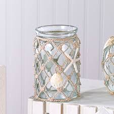 Pressed glass has a vintage charm that's sweet yet practical. Sea Glass Resin Coastal Bath Accessories