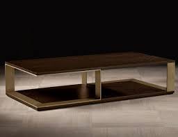The dark acacia veneer is stricking against a colorful wall in your dining room. Modern Coffee Table With Brass Legs With The Touch Of Luxury Design This Center Table Is Perfect For S Coffee Table Modern Coffee Tables Wooden Coffee Table