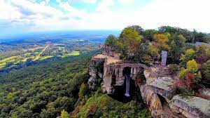 America's deepest commercial cave and largest underground waterfall open for on their initial trip into the caverns, they discovered numerous interesting rock formations and were awestruck to find a magnificent waterfall. Lookout Mountain S Rock City Georgia And Ruby Falls An Aerial View Youtube