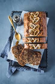 Banana Bread With Vanilla Maple Glaze Queen Fine Foods With A Sweet Crunchy Crust On The Outside Thanks To The Pure M Food Banana Recipes Baking Essentials