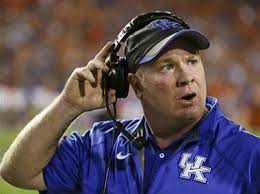 LSU coach Les Miles set to complete a tour of facing the Stoops family when  Kentucky comes to town