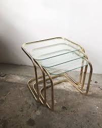 Vintage Brass Nesting Tables With Glass Tops 158 For The Set Of Tables Tables Separa Vintage Furniture Design Glass Nesting Tables Furniture Accessories