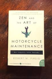 The book demonstrates that motorcycle maintenance may be dull and tedious drudgery or an enjoyable and pleasurable pastime. Zen And The Art Of Motorcycle Maintenance Robert M Pirsig Book Laid On Wooden Table Keeping Up With The Penguins Keeping Up With The Penguins