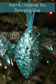 Peacock wedding decorations peacock theme wedding centerpieces peacock hair peacock feathers albino peacock black birdcage veils we would like to share with you a room dressed in peacock, animal print and a touch of glitter for the christmas season. Peacock Christmas Tree Decorating Ideas The Big Red Bow