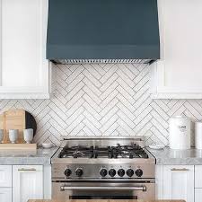 A striking set of canisters can give an older countertop an instant update, or show off a new countertop to best advantage. White Flour Canister Design Ideas