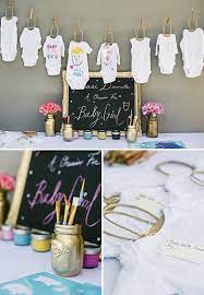 Onesie Decorating Station Would Be A Great Idea For A Baby Shower Visit Ontobaby Com Baby Shower Onesie Decorating Baby Shower Onesie Onesie Decorating