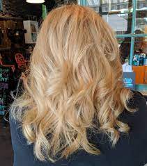 Loving This Golden Honey Blonde We Did A Bleach Retouch Melted And Multi Level Toner Healthy Trim And Gorgeous Bouncy Blowout On Her Naturally Curly Hai