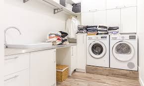 One uninspiring laundry center was livened up by a rough hewn shelf lined with identical gray storage boxes. Utility Room Design Ideas For Your Home Design Cafe