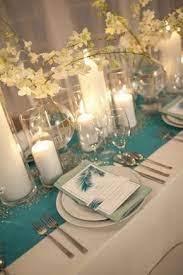 Idees Mariage Turquoise Blanc Carnet D Inspiration 1 Melle Cereza Blog Mariage Original Teal Wedding Centerpieces Table Arrangements Wedding Wedding Centerpieces