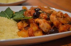 While apricots cook, heat remaining 1/4 cup oil in a small skillet over moderate heat and cook almonds, stirring occasionally, until just golden, 1 to 2 minutes. Roast Chicken With Couscous Prunes Apricots Dates Almonds Yvonne Maffei