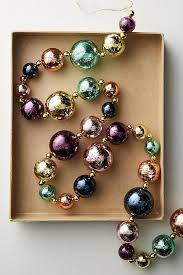 Add garlands to any room for festive cheer or hang a door wreath for a warm welcome. Slide View 1 Glass Bauble Garland Glass Bauble Anthropologie Christmas Anthropologie Holiday