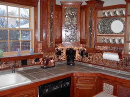 If you need to cut a hole in the tile for a switch plate or outlet, use a drill to start the hole. Diy Metal Backsplash Ideas You Ll Love To Create Decorative Ceiling Tiles Inc Store