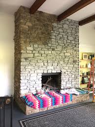Today, we're going to go over the best way to whitewash your stone fireplace. Our Farmhouse White Washing A Stone Fireplace Studio Quirk