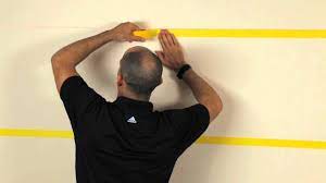 If you're going with completely different colors, choose one of the colors as the base color and paint the whole wall that one color. How To Paint An Accent Stripe Youtube