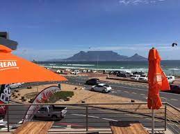 A View Of Table Mountain Outside At Jerry S Burger Bar In Blouberg Photo Burger Bar Burger Table Mountain