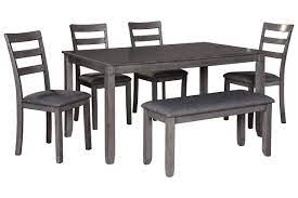 A la carte rectangular farmhouse dining table w 6 chairs bridson dining room table and chairs with bench set of 6 7 piece denstein modern dining set 72 gl top table 6. Bridson Dining Table And Chairs With Bench Set Of 6 Ashley Furniture Homestore