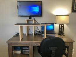 A standing desk converter is a device that rests on top of your desk and raises your workstation up and down so you the rising tide of standing desk risers over the last few years has flooded the market with options. 19 Wonderful Ideas For Diy Standing Desks To Keep You Organized And Productive Crafty Club Diy Craft Ideas