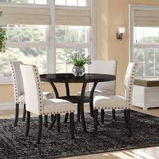 Complement modern decor with sleek black pieces, boxy silhouettes, and iron, metal, or glass details. Five Piece Dining Set Off 54