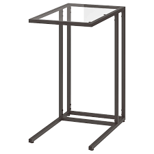 Ein klassischer beistelltisch aus glas kann dir extra ablageraum bieten und bringt einen hauch glamour ins wohnzimmer. Vittsjo Black Brown Glass Laptop Stand 35x65 Cm Ikea