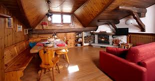 Living with sofa, sat tv (sky), dvd, fridge, drinks warmer; Zuelli Alpenlodge Appartamenti Livigno