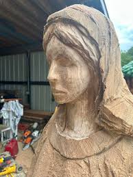 Finishing a full-size Indian statue with Red Oak wood