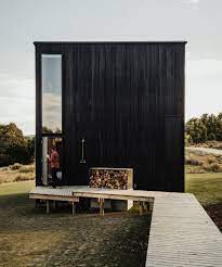 Taylor Hinds Architects Builds Tiny Black Cabin Retreat In Tasmania Tiny House Exterior Tiny House Australian Architecture