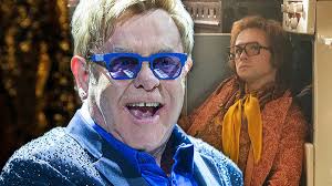 Watch: Rocketman's Taron Egerton Performs Live Duet With Elton John