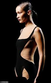 Oct 22, 2020 · it seems right that mugler's artistic director casey cadwallader and bella hadid would meet on the dance floor. Braless Bella Hadid In Mugler Swimsuit For Paris Fashion Week Daily Mail Online