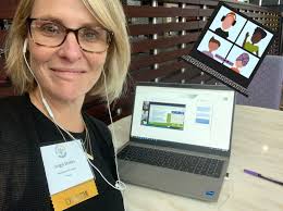 At a conference, attending a virtual conference!