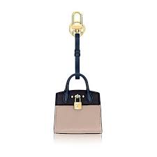 Louis Vuitton Aksessuar Dlya Sumki I Brelok Dlya Klyuchej City Steamer Liked On Polyvore Featuring Home Kitchen Dining And Lo Bag Charm Fancy Accessories Bags