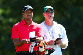 Who Is Tiger Woods Caddie How Long Have They Been Paired And Why Did He Pay A Heckler