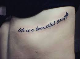 #tattoo struggles #damn jobs #and i want to be a museum curator so no to probably any of those hip and hoppin bosses that allow visible tattoos. Life Is A Beautiful Struggle Tattoo Under Lourdes