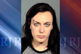 Woman charged in death of man whose body was burned, dismembered