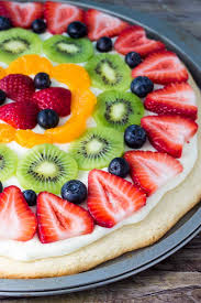This Sugar Cookie Fruit Pizza Is Perfect For Summer Decorated With Tangy Cream Chees Fruit Pizza Sugar Cookie Easy Sugar Cookie Fruit Pizza Fruit Pizza Recipe