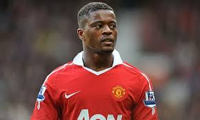 Manchester United's Patrice Evra signs contract extension | Manchester  United | The Guardian