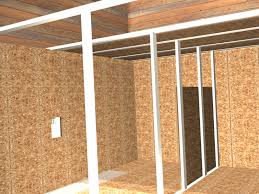 Shoot one nail between each pair of studs. How To Install An Insulated Barricade Modular Panel System In Basements