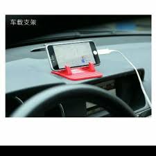 Letak gam pada corong yang disediakan untuk gam masuk dalam rekahan. Tempat Letak Handphone Shopee Malaysia