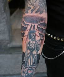 This tattoo includes a black inked skull face that fits on your arm and black outlined roses with red ink inside. 51 Best Forearm Tattoos For Men Cool Design Ideas 2021 Guide