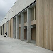Inside the church the relics of amalberga of temse are venerated. Office Building And Warehouse At Temse By Claessens Architecten Fassadengestaltung Architektur Betonfassade