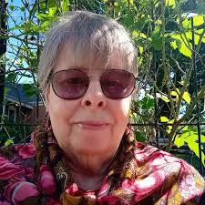 Is it normal for hummingbirds to fly to windows?