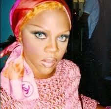 Lil'Kim wearing look 10 from @iceberg's Spring '00 Collection