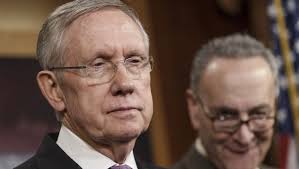 Harry Reid says FBI director 'may have broken the law'