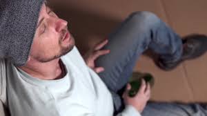 A Depressed Guy Is Carrying Alcohol.