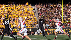 What is the score of the Iowa football game? Hawkeyes trail Ohio State