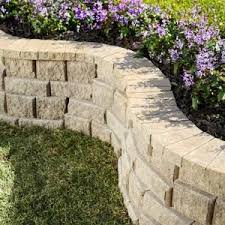 Larger, heavier units are used at the bottom of the wall and gradually smaller units are used as. Pavestone Rockwall 2 In X 4 25 In X 9 In Pecan Concrete Wall Cap 79924 The Home Depot Natural Landscaping Landscape Fantasy Landscape