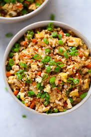 This Cauliflower Fried Rice Recipe S Ready In Less Than 20 Minutes And It S Loaded Cauliflower Fried Rice Recipes Cauliflower Fried Rice Vegetarian Fried Rice